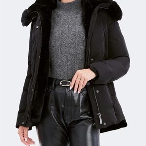 Around town or ski mountain luxury Dawn Levy Jacket in black. New with tag